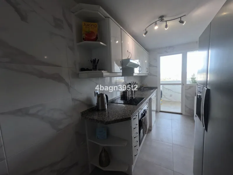 Located in the highly sought-after Phase 1 of Jardin Botánico in La Cala de Mijas, this beautifully refurbished 2-bedroom apartment offers contemporary living in a prime coastal setting.