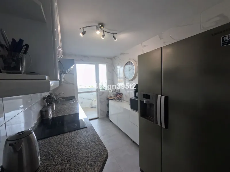 Located in the highly sought-after Phase 1 of Jardin Botánico in La Cala de Mijas, this beautifully refurbished 2-bedroom apartment offers contemporary living in a prime coastal setting.