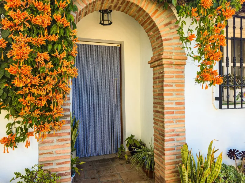 This beautiful modern villa with 5 bedrooms and 3 bathrooms enjoys an enviable elevated position above the charming white village of Cómpeta, offering sweeping views of the Mediterranean Sea, rolling countryside, and the village rooftops below. Stylish, s