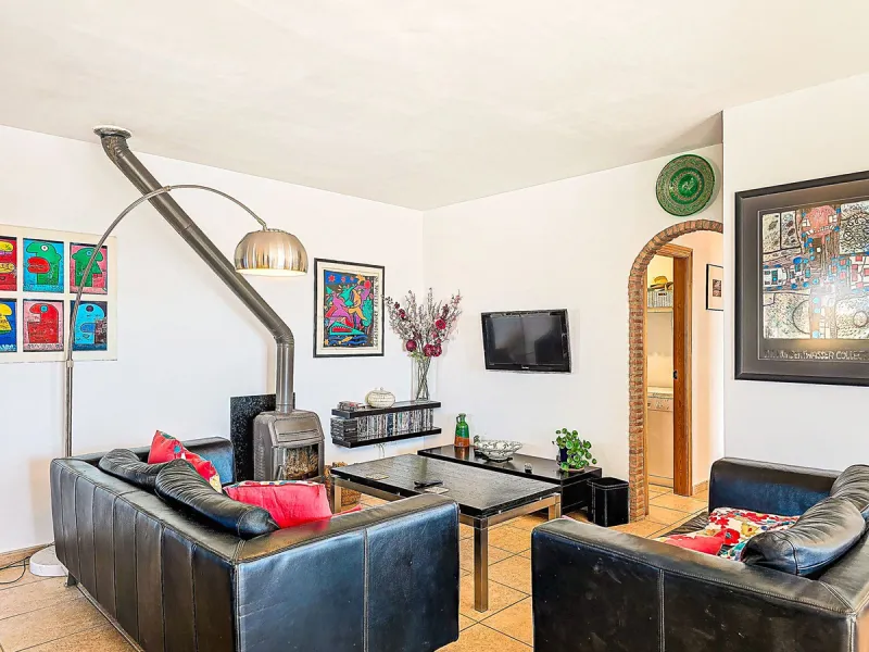 This beautiful modern villa with 5 bedrooms and 3 bathrooms enjoys an enviable elevated position above the charming white village of Cómpeta, offering sweeping views of the Mediterranean Sea, rolling countryside, and the village rooftops below. Stylish, s