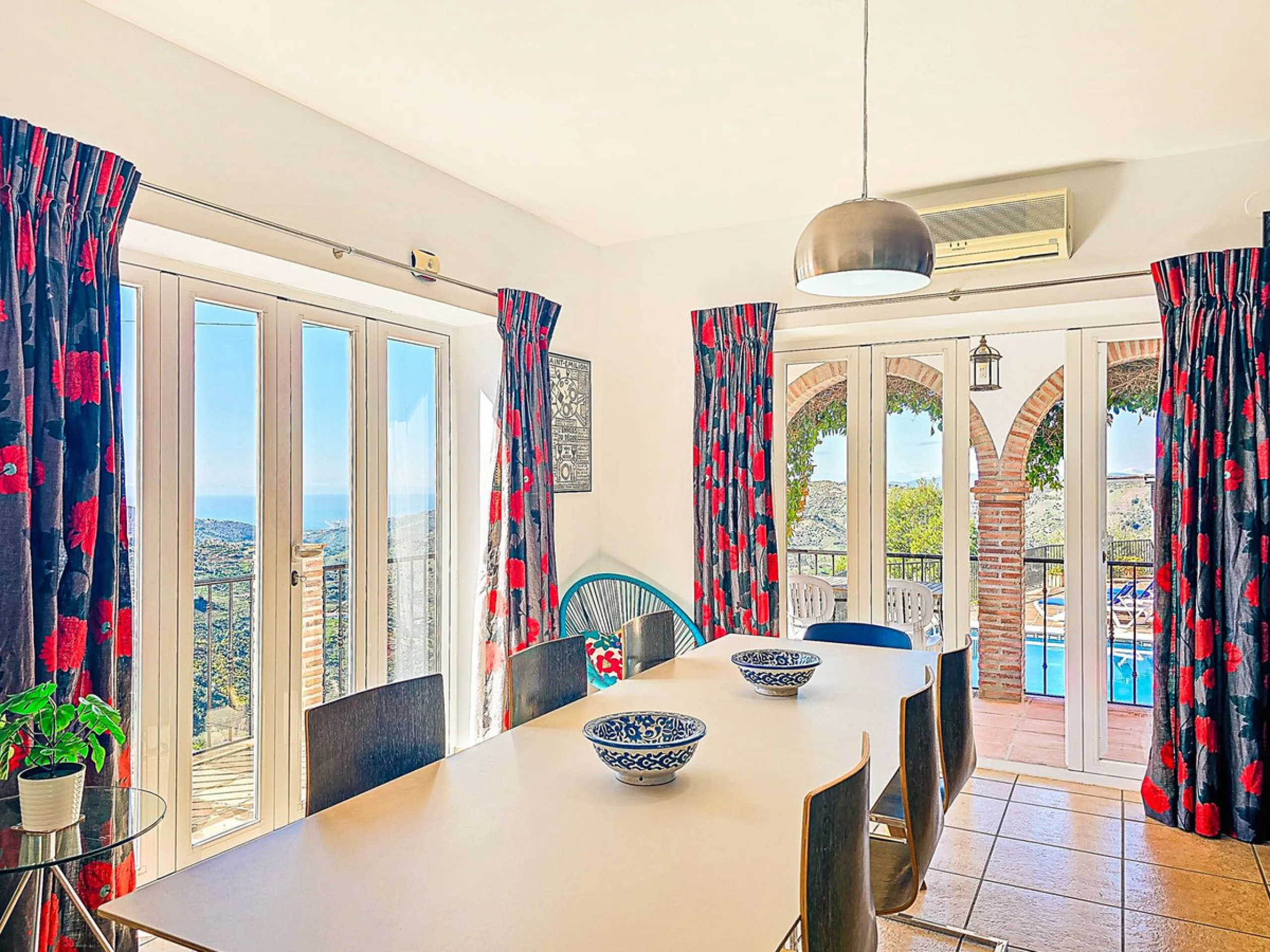 This beautiful modern villa with 5 bedrooms and 3 bathrooms enjoys an enviable elevated position above the charming white village of Cómpeta, offering sweeping views of the Mediterranean Sea, rolling countryside, and the village rooftops below. Stylish, s