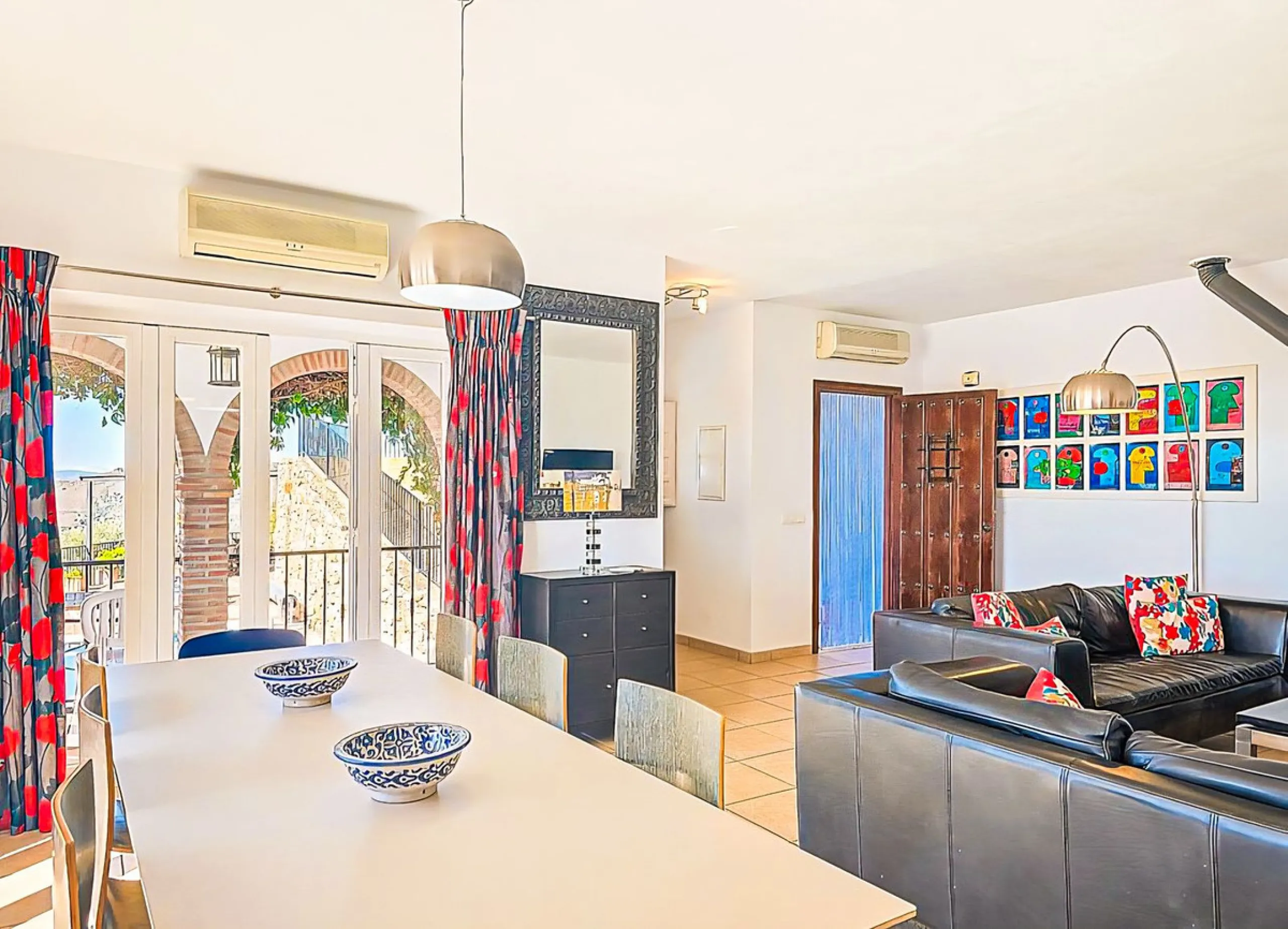 This beautiful modern villa with 5 bedrooms and 3 bathrooms enjoys an enviable elevated position above the charming white village of Cómpeta, offering sweeping views of the Mediterranean Sea, rolling countryside, and the village rooftops below. Stylish, s