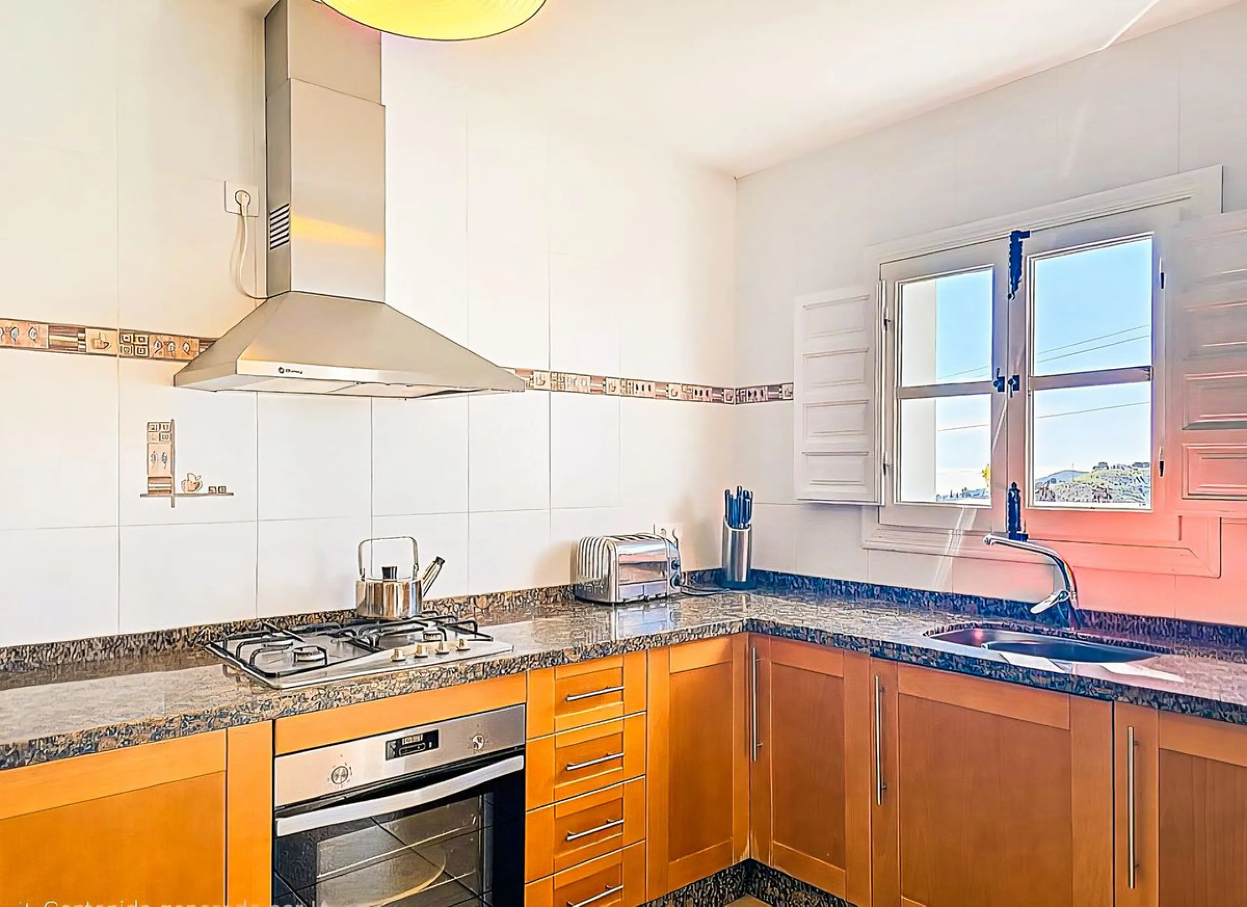 This beautiful modern villa with 5 bedrooms and 3 bathrooms enjoys an enviable elevated position above the charming white village of Cómpeta, offering sweeping views of the Mediterranean Sea, rolling countryside, and the village rooftops below. Stylish, s