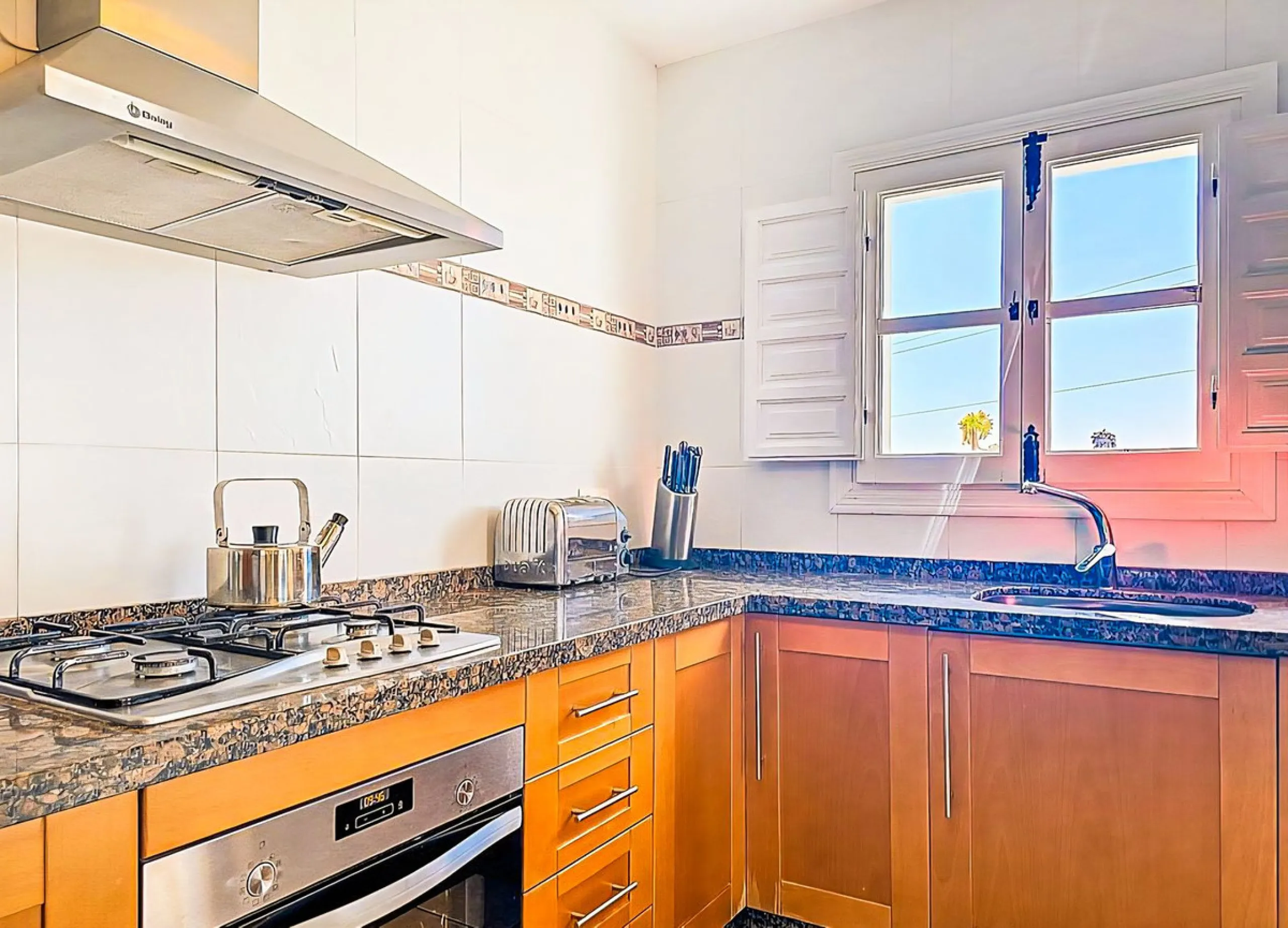 This beautiful modern villa with 5 bedrooms and 3 bathrooms enjoys an enviable elevated position above the charming white village of Cómpeta, offering sweeping views of the Mediterranean Sea, rolling countryside, and the village rooftops below. Stylish, s