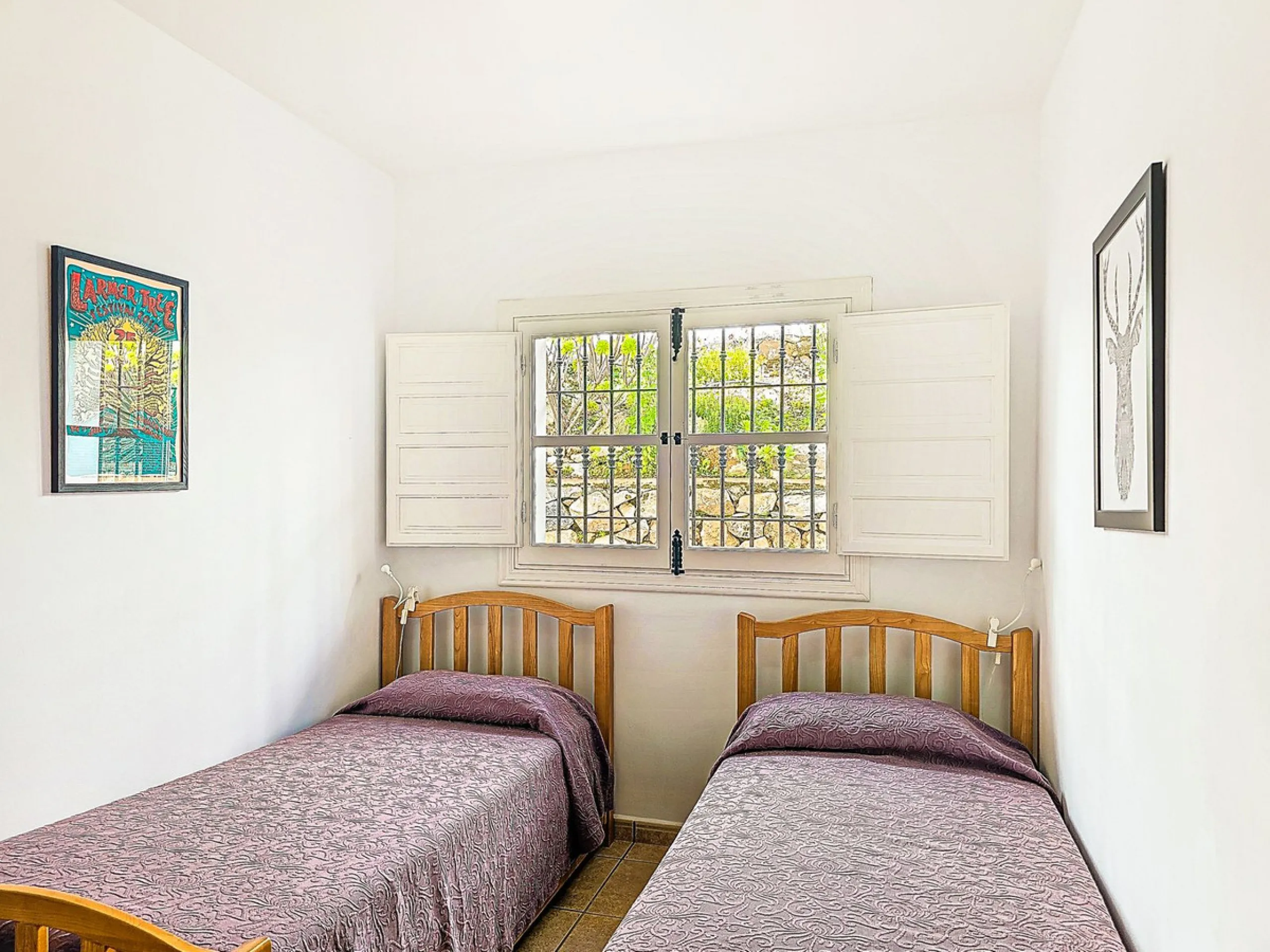 This beautiful modern villa with 5 bedrooms and 3 bathrooms enjoys an enviable elevated position above the charming white village of Cómpeta, offering sweeping views of the Mediterranean Sea, rolling countryside, and the village rooftops below. Stylish, s