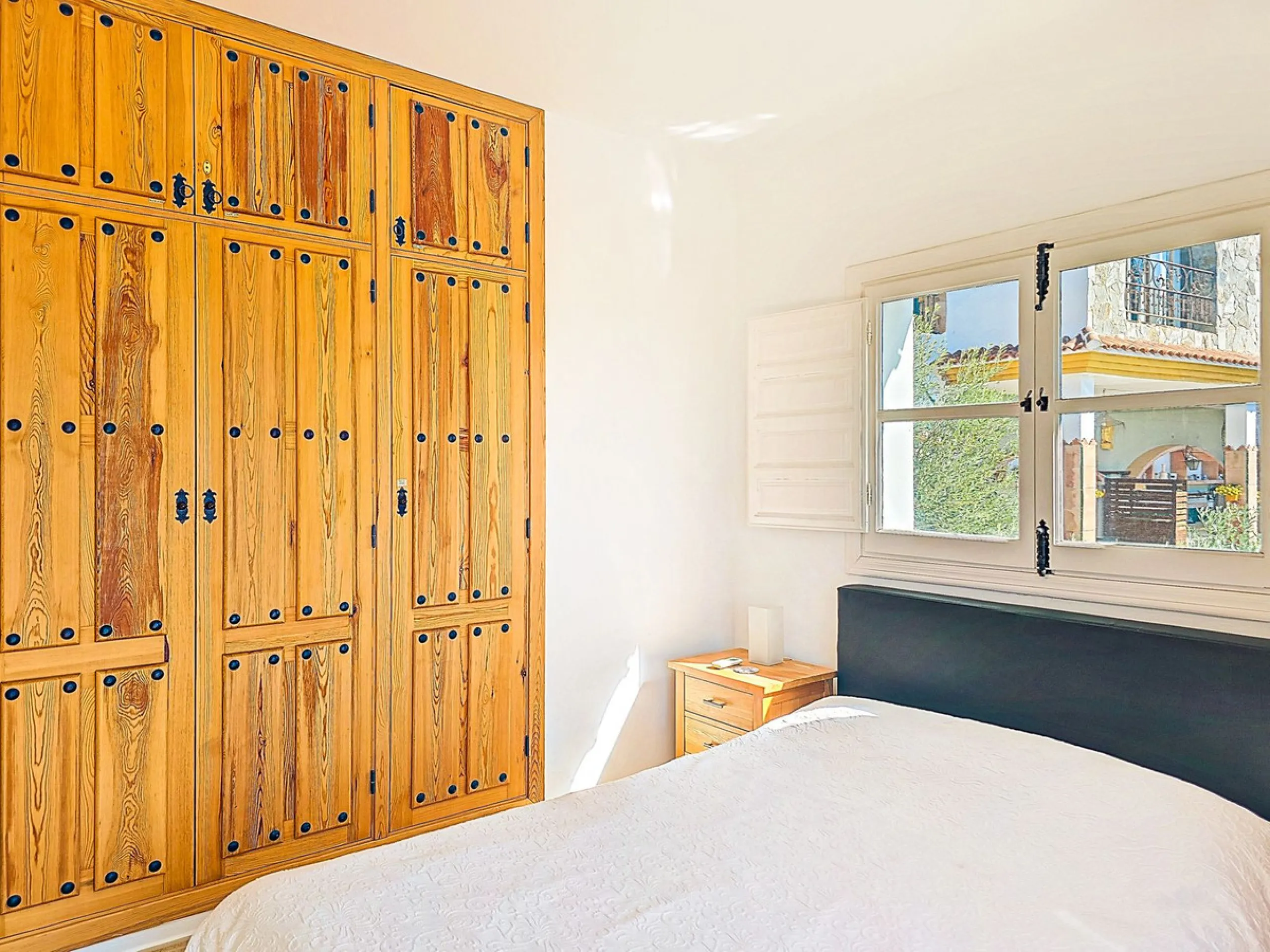 This beautiful modern villa with 5 bedrooms and 3 bathrooms enjoys an enviable elevated position above the charming white village of Cómpeta, offering sweeping views of the Mediterranean Sea, rolling countryside, and the village rooftops below. Stylish, s