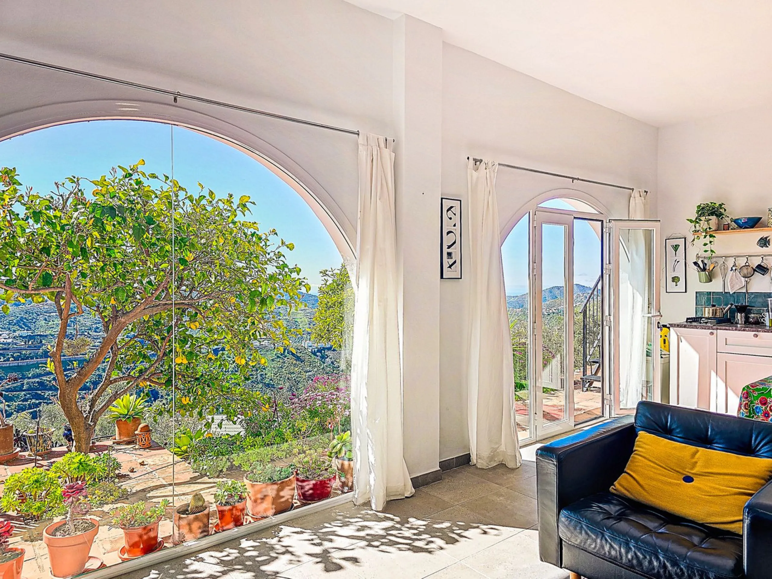 This beautiful modern villa with 5 bedrooms and 3 bathrooms enjoys an enviable elevated position above the charming white village of Cómpeta, offering sweeping views of the Mediterranean Sea, rolling countryside, and the village rooftops below. Stylish, s