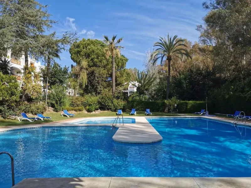 Located in one of the most established and beautifully maintained urbanisations in Nueva Andalucía, this charming two bedroom, two bathroom apartment offers comfort, space and an exceptional lifestyle setting in the heart of the Golf Valley.