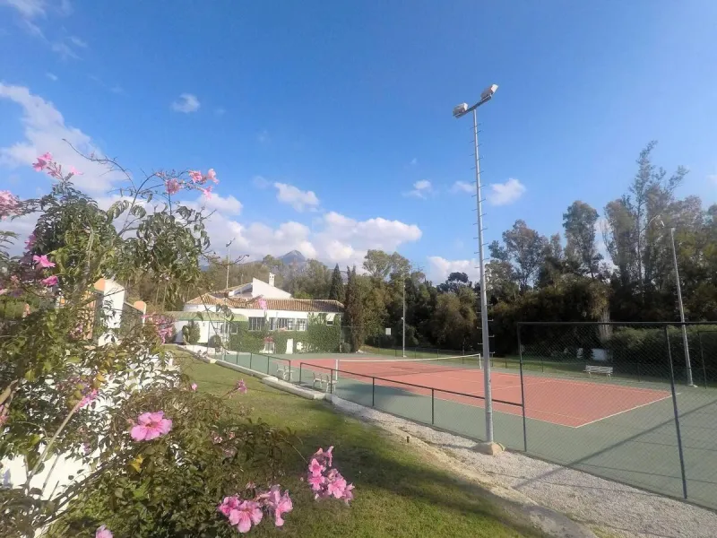Located in one of the most established and beautifully maintained urbanisations in Nueva Andalucía, this charming two bedroom, two bathroom apartment offers comfort, space and an exceptional lifestyle setting in the heart of the Golf Valley.