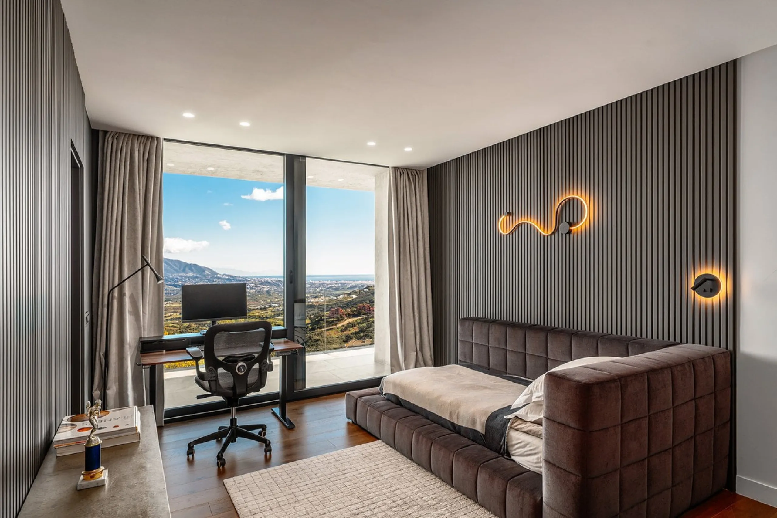 Perched on the coast, in the tranquil hills of La Mairena, this contemporary villa offers a balanced blend of architectural elegance, privacy, and expansive views of the Mediterranean. Surrounded by protected natural landscapes, the residence enjoys a ser