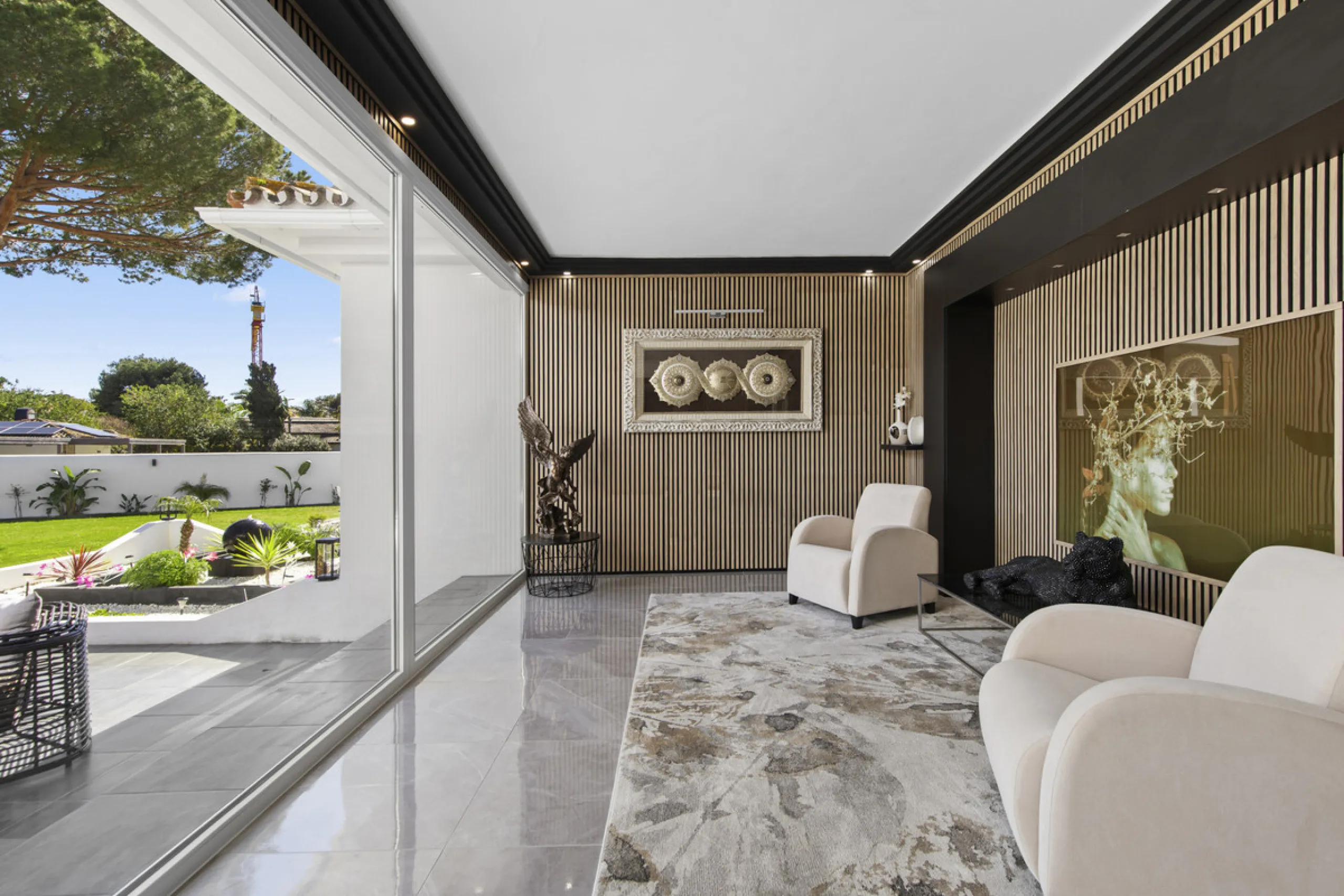 Located in the prestigious area of Guadalmina Baja – Casasola, just a short stroll from the beach, this stunning recently renovated villa sits on an exceptionally large private plot, offering space, privacy, and effortless coastal living.