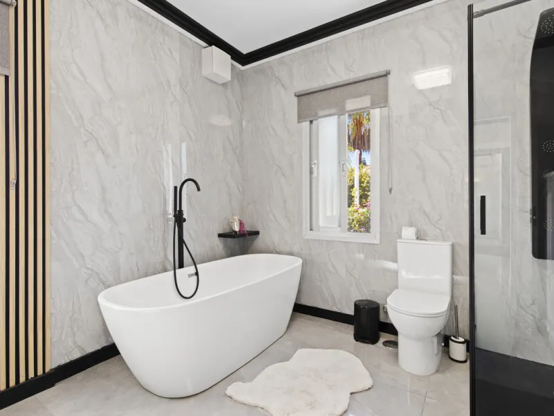 Located in the prestigious area of Guadalmina Baja – Casasola, just a short stroll from the beach, this stunning recently renovated villa sits on an exceptionally large private plot, offering space, privacy, and effortless coastal living.