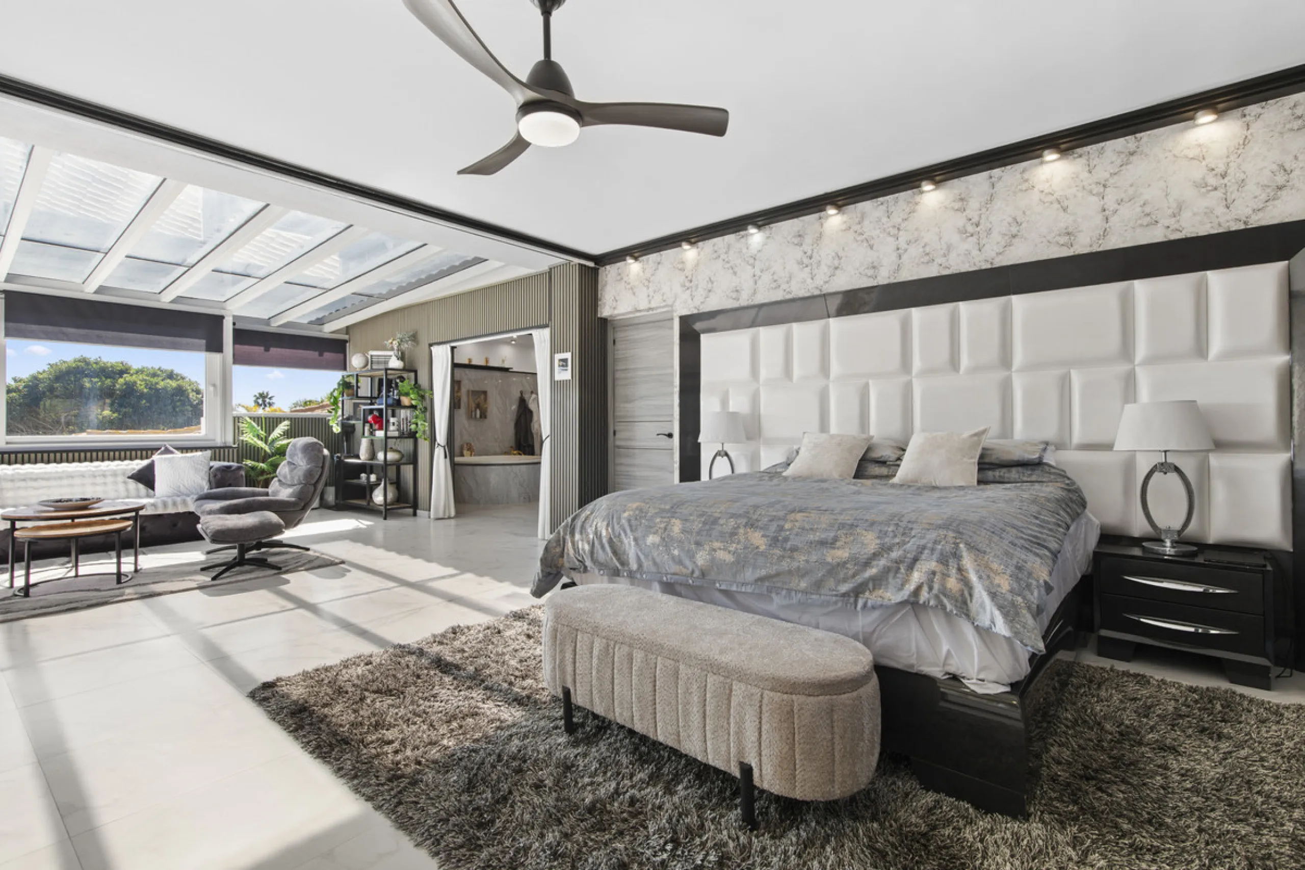 Located in the prestigious area of Guadalmina Baja – Casasola, just a short stroll from the beach, this stunning recently renovated villa sits on an exceptionally large private plot, offering space, privacy, and effortless coastal living.