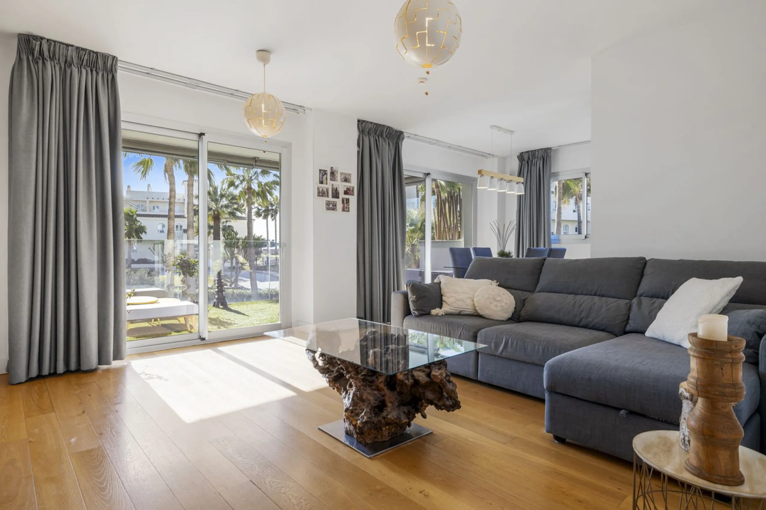 Discover this stylish first-floor apartment in the exclusive El Chaparral area of Mijas Costa, featuring a southwest orientation and a prime location between Fuengirola and La Cala de Mijas.