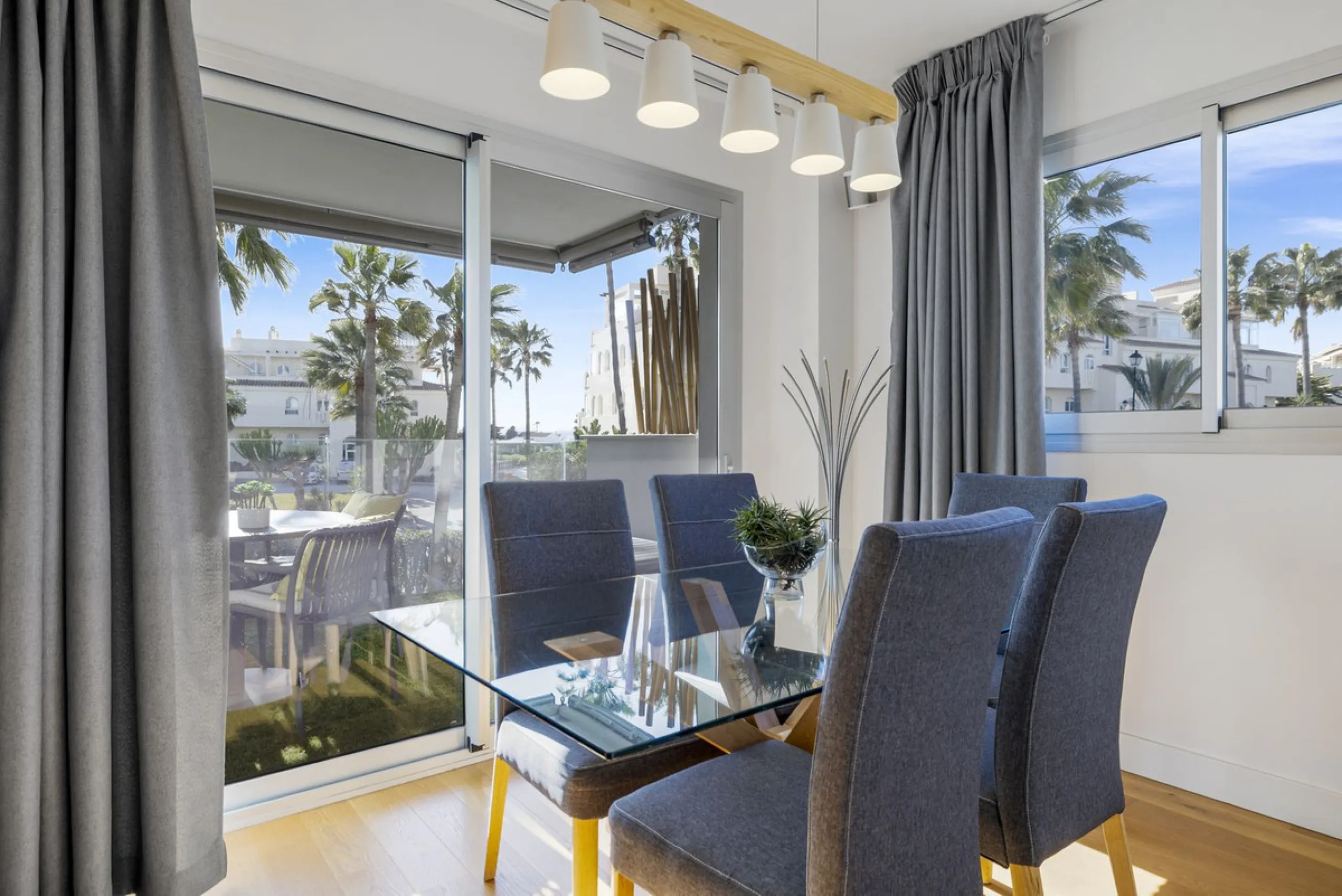 Discover this stylish first-floor apartment in the exclusive El Chaparral area of Mijas Costa, featuring a southwest orientation and a prime location between Fuengirola and La Cala de Mijas.