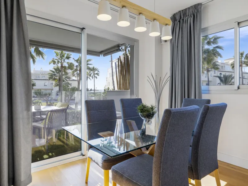 Discover this stylish first-floor apartment in the exclusive El Chaparral area of Mijas Costa, featuring a southwest orientation and a prime location between Fuengirola and La Cala de Mijas.