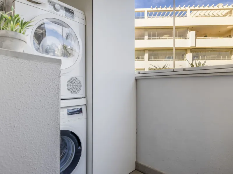 Discover this stylish first-floor apartment in the exclusive El Chaparral area of Mijas Costa, featuring a southwest orientation and a prime location between Fuengirola and La Cala de Mijas.
