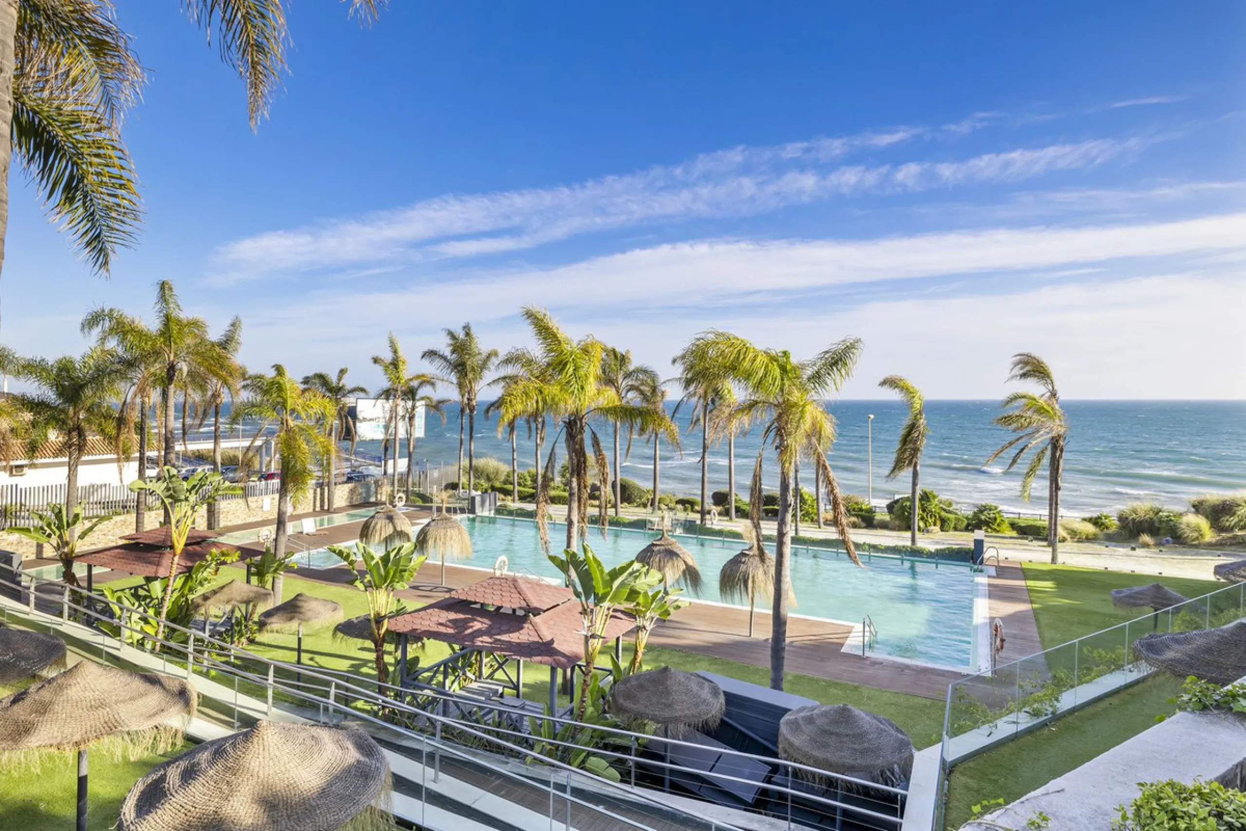 Discover this stylish first-floor apartment in the exclusive El Chaparral area of Mijas Costa, featuring a southwest orientation and a prime location between Fuengirola and La Cala de Mijas.
