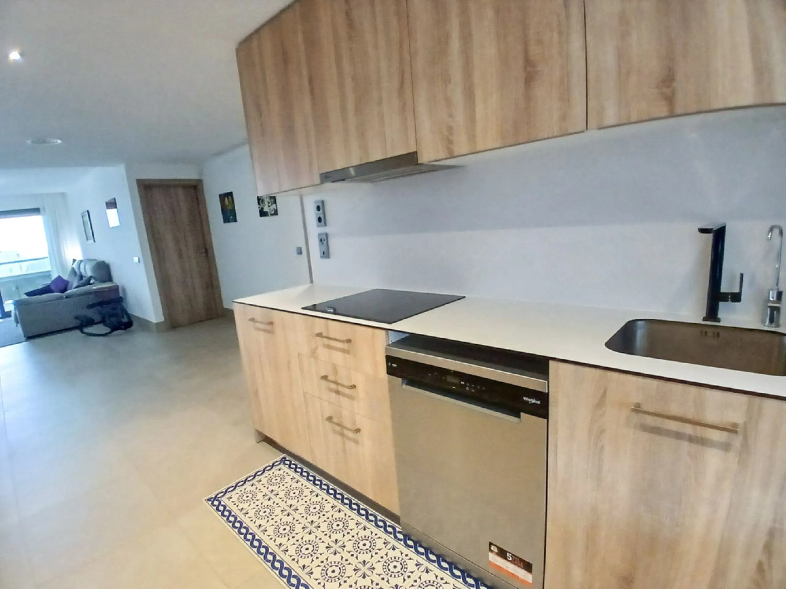 We are delighted to introduce this new contemporary apartment in the popular Solemar development. As you enter, you will find the fully equipped kitchen with all integrated appliances that flow into the spacious lounge and dining area, leading out to the 
