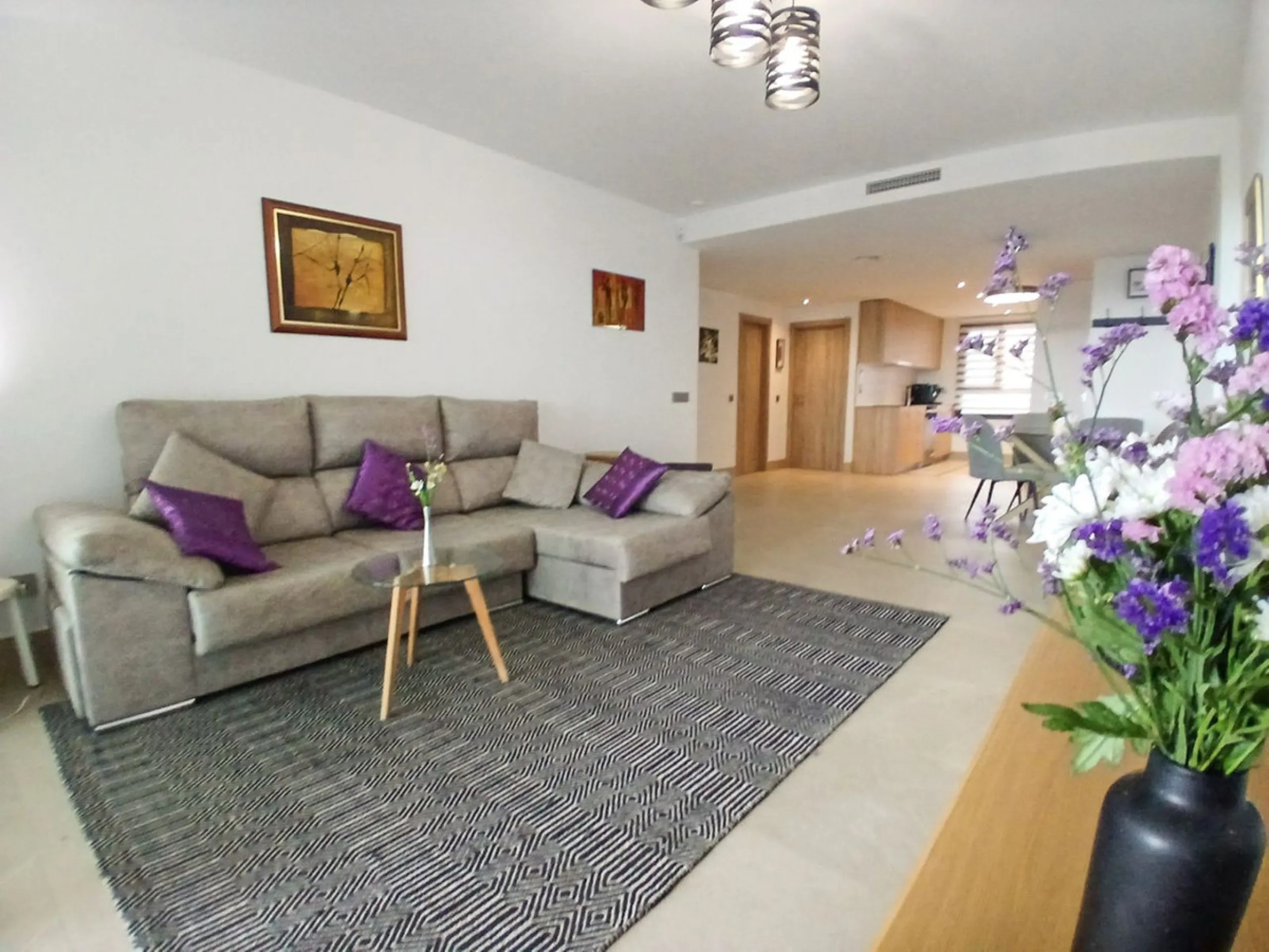 We are delighted to introduce this new contemporary apartment in the popular Solemar development. As you enter, you will find the fully equipped kitchen with all integrated appliances that flow into the spacious lounge and dining area, leading out to the 