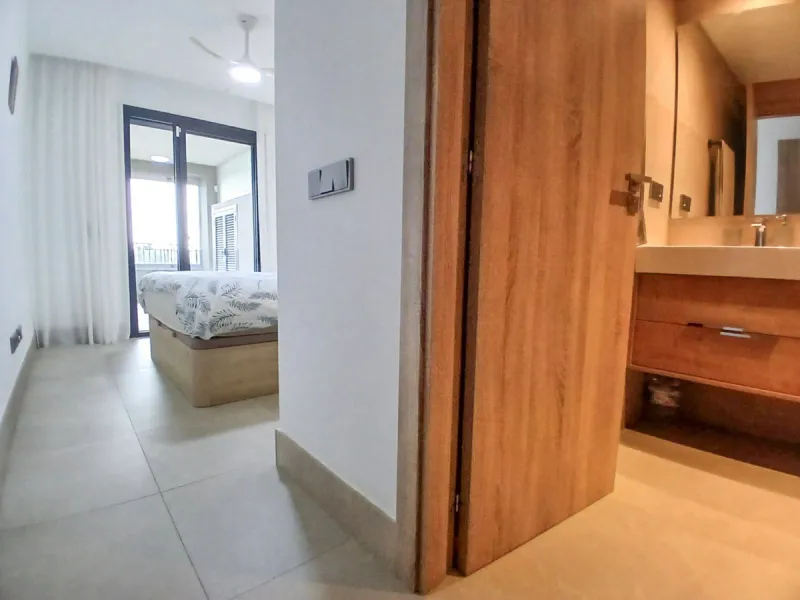 We are delighted to introduce this new contemporary apartment in the popular Solemar development. As you enter, you will find the fully equipped kitchen with all integrated appliances that flow into the spacious lounge and dining area, leading out to the 