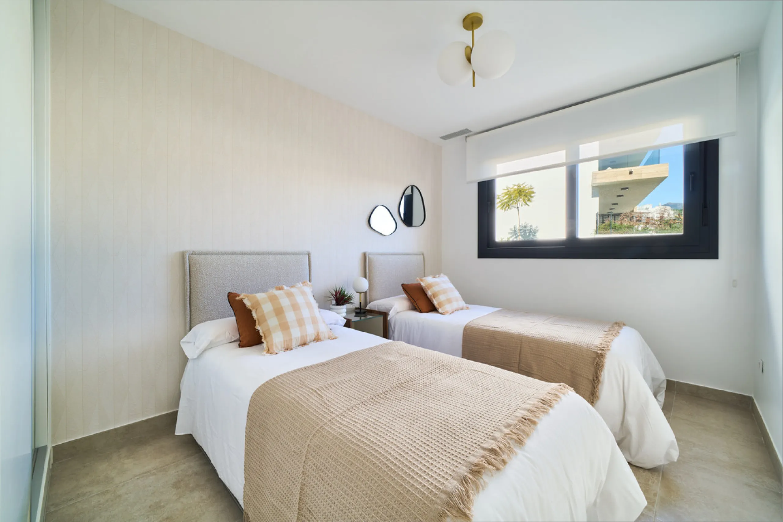 Elegant 3-bedroom, 2-bathroom apartment located on the first floor within an exclusive private residential complex in the Atalaya area, in the golden triangle of Marbella – Estepona – Benahavís.