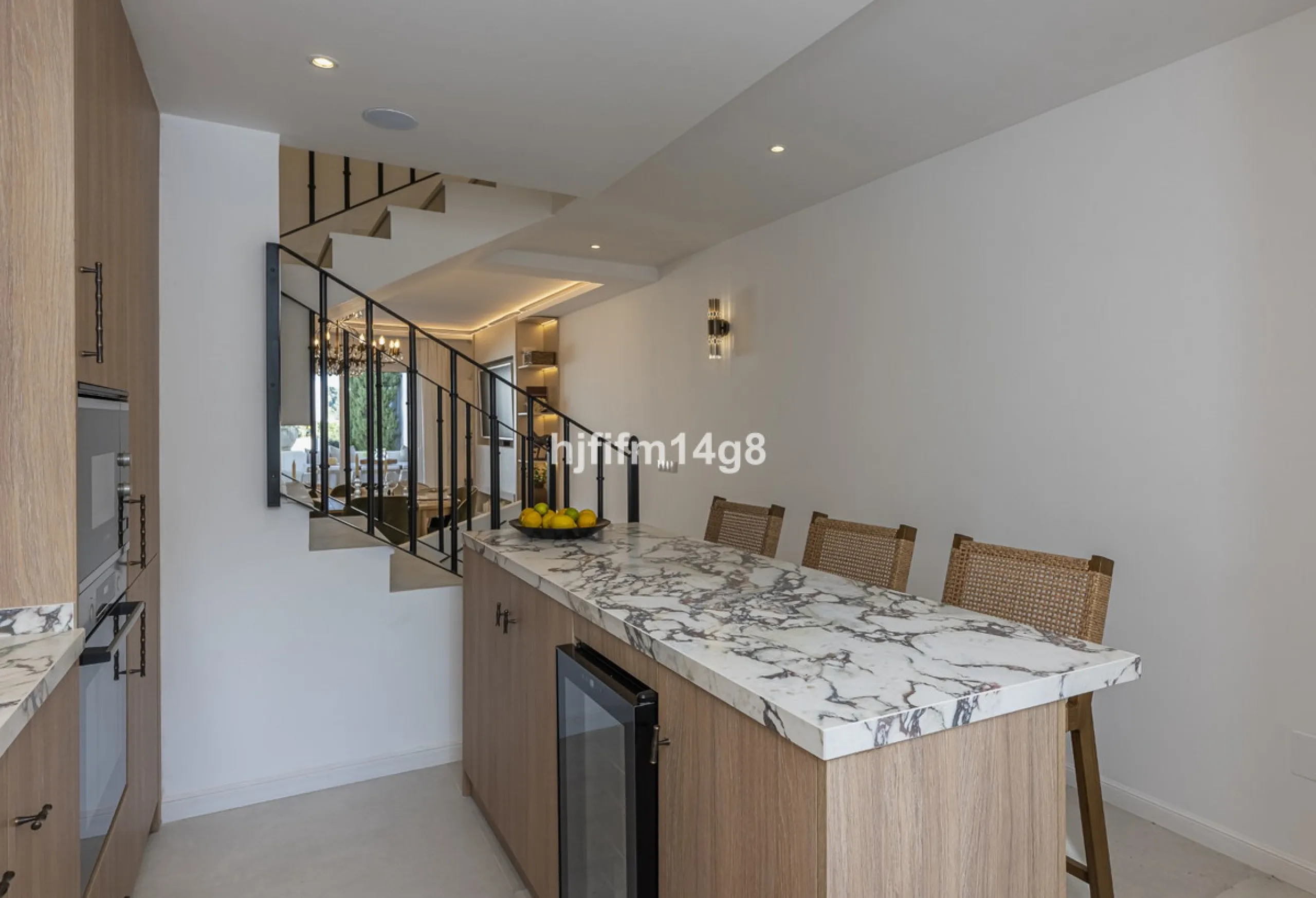 We are delighted to present this stunning, fully refurbished 4-bedroom townhouse located in the sought-after San Javier urbanisation in Nueva Andalucía, within the prestigious Marbella area. Set in a charming and very intimate residential community of jus