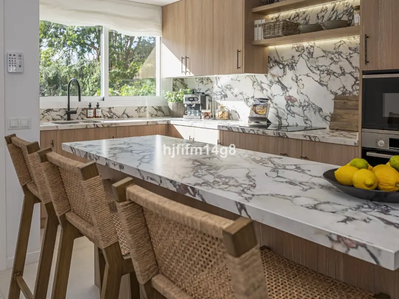 We are delighted to present this stunning, fully refurbished 4-bedroom townhouse located in the sought-after San Javier urbanisation in Nueva Andalucía, within the prestigious Marbella area. Set in a charming and very intimate residential community of jus