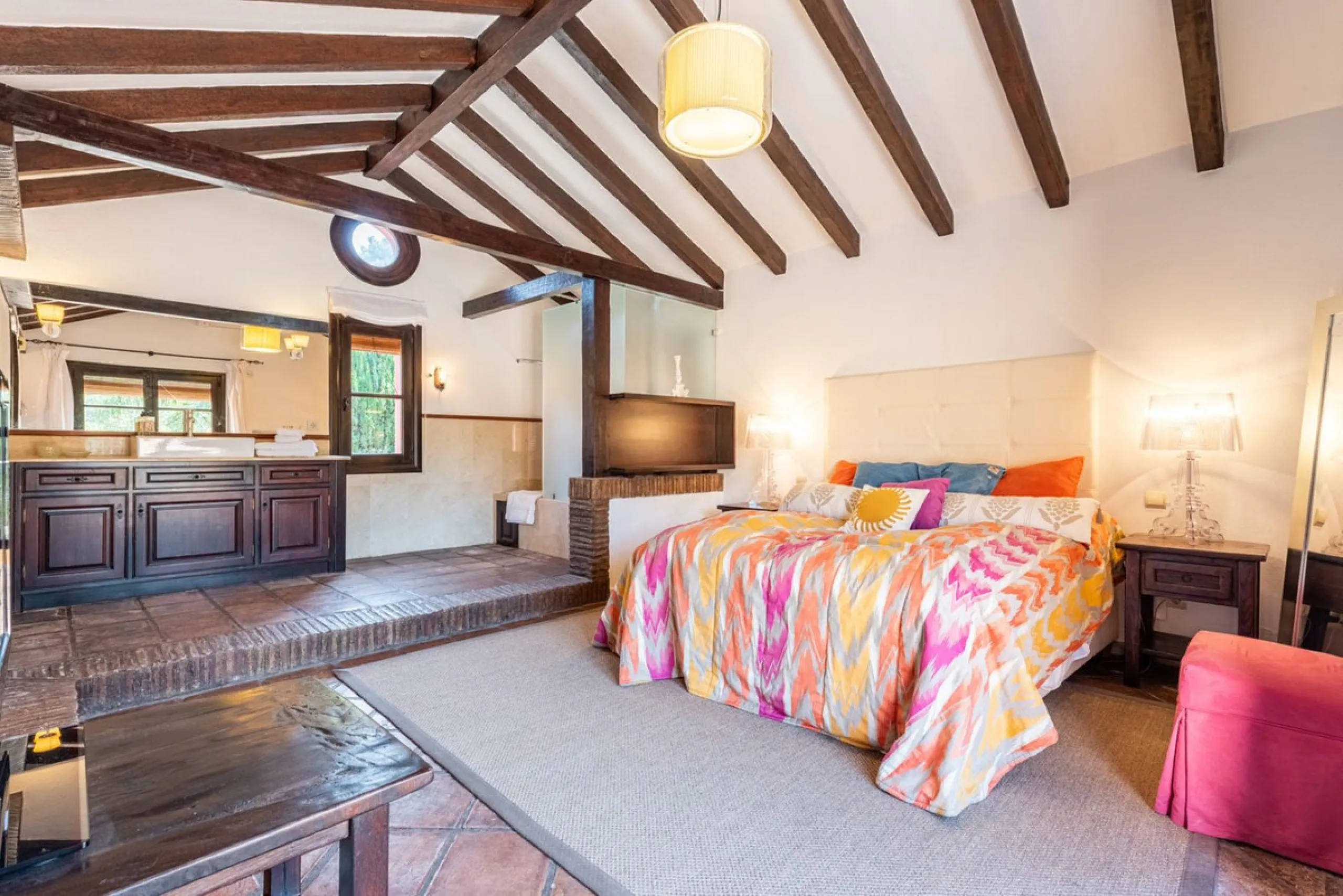 This Andalusian-style villa in El Paraiso Medio offers privacy, stunning views, and proximity to golf courses, and amenities.