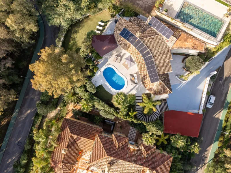 Introducing a stunning contemporary villa located in the prestigious, gated community of El Herrojo, Benahavís — one of Marbella's most desirable addresses. This elegant home combines modern luxury with serene Mediterranean living, offering privacy, secur