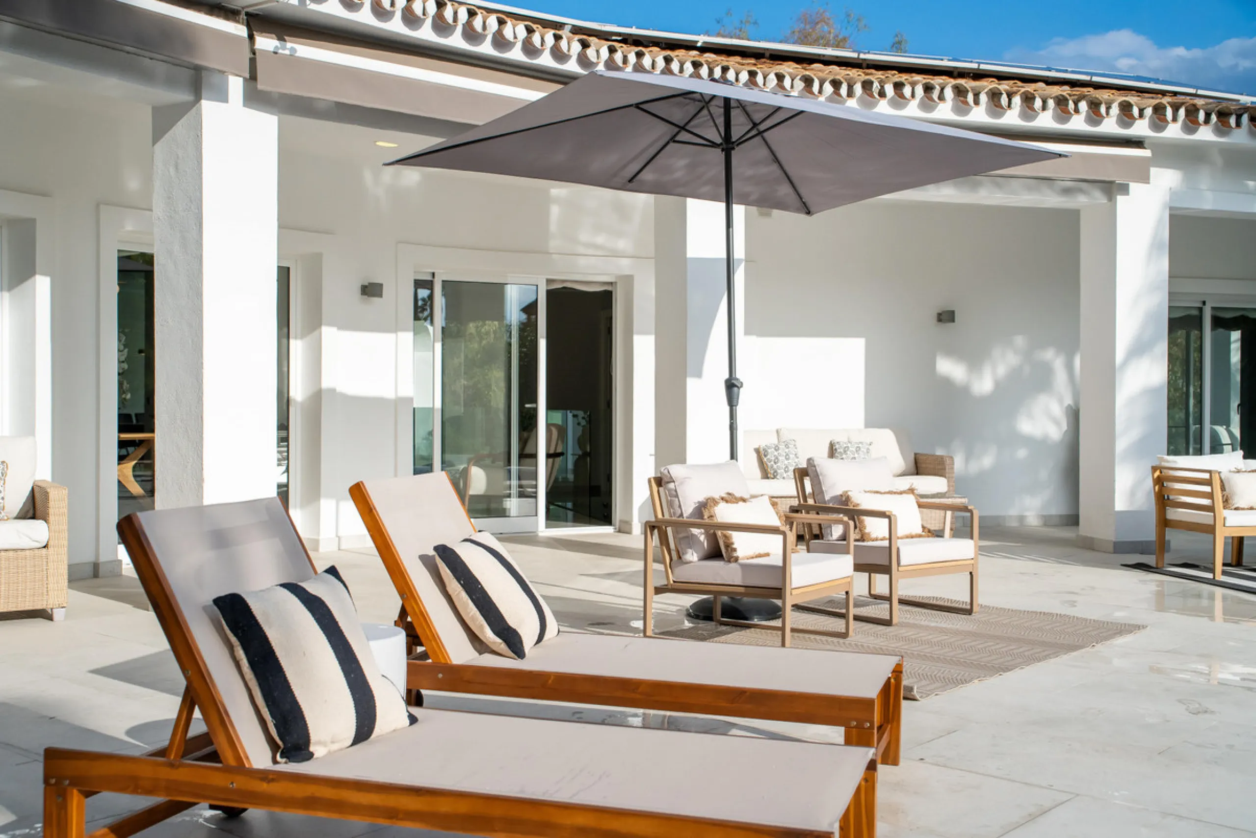 Introducing a stunning contemporary villa located in the prestigious, gated community of El Herrojo, Benahavís — one of Marbella's most desirable addresses. This elegant home combines modern luxury with serene Mediterranean living, offering privacy, secur
