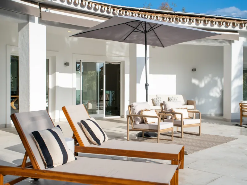 Introducing a stunning contemporary villa located in the prestigious, gated community of El Herrojo, Benahavís — one of Marbella's most desirable addresses. This elegant home combines modern luxury with serene Mediterranean living, offering privacy, secur