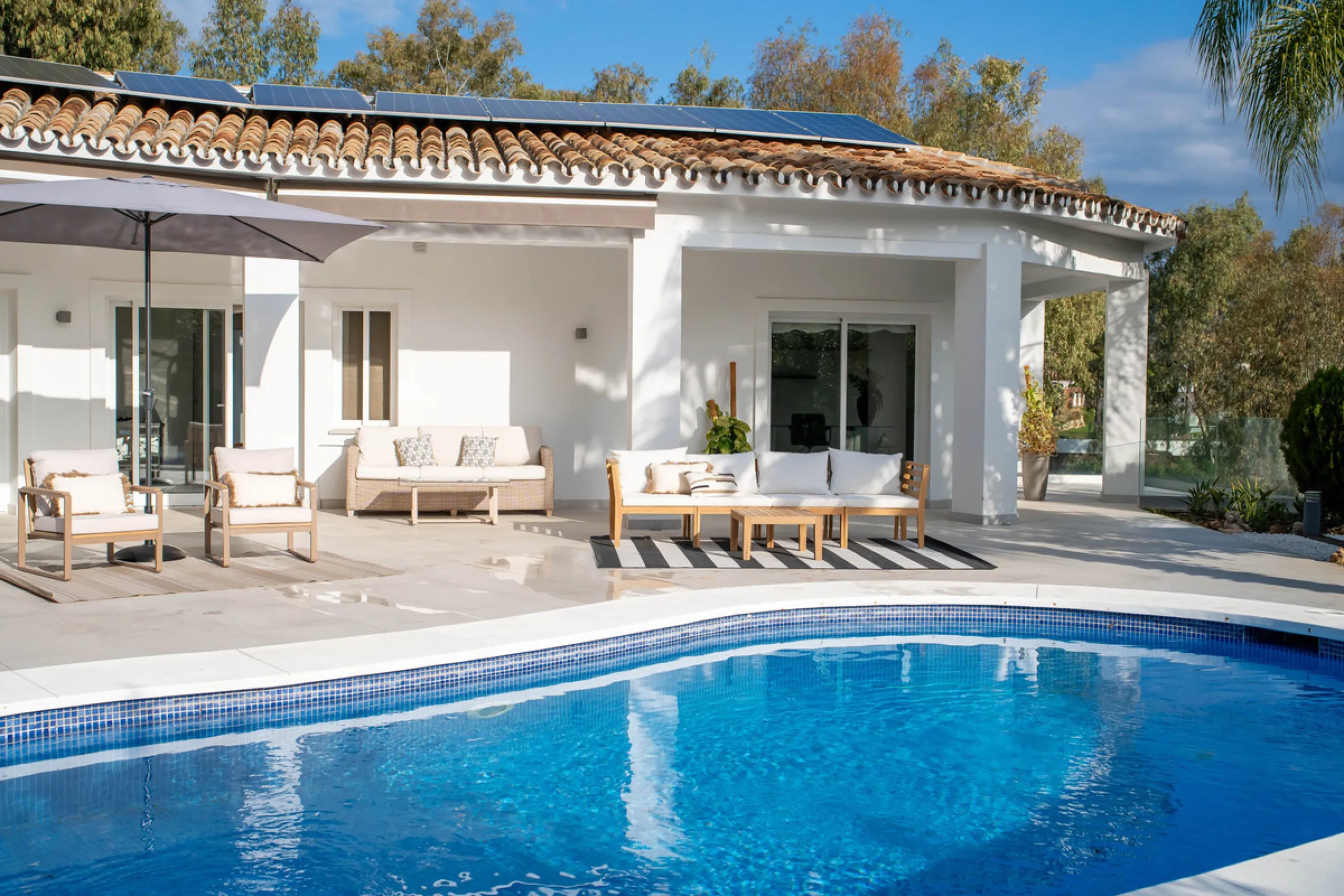 Introducing a stunning contemporary villa located in the prestigious, gated community of El Herrojo, Benahavís — one of Marbella's most desirable addresses. This elegant home combines modern luxury with serene Mediterranean living, offering privacy, secur