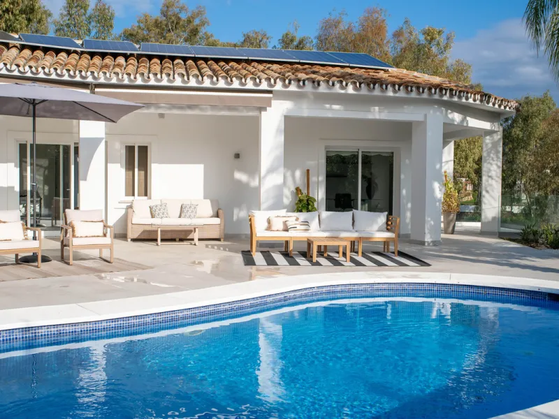 Introducing a stunning contemporary villa located in the prestigious, gated community of El Herrojo, Benahavís — one of Marbella's most desirable addresses. This elegant home combines modern luxury with serene Mediterranean living, offering privacy, secur