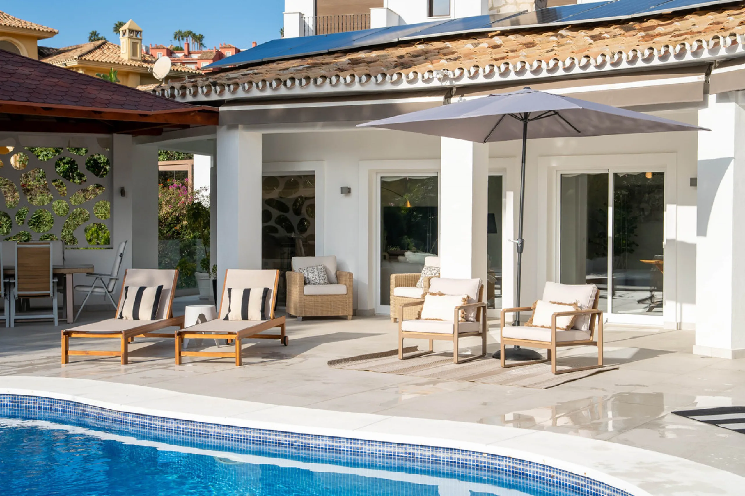 Introducing a stunning contemporary villa located in the prestigious, gated community of El Herrojo, Benahavís — one of Marbella's most desirable addresses. This elegant home combines modern luxury with serene Mediterranean living, offering privacy, secur