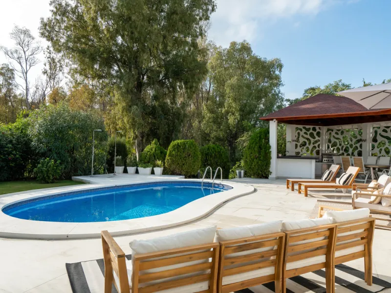 Introducing a stunning contemporary villa located in the prestigious, gated community of El Herrojo, Benahavís — one of Marbella's most desirable addresses. This elegant home combines modern luxury with serene Mediterranean living, offering privacy, secur