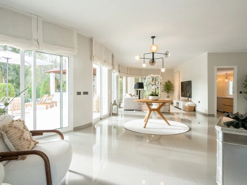 Introducing a stunning contemporary villa located in the prestigious, gated community of El Herrojo, Benahavís — one of Marbella's most desirable addresses. This elegant home combines modern luxury with serene Mediterranean living, offering privacy, secur