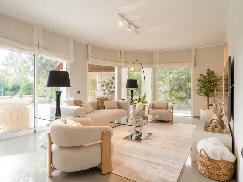 Introducing a stunning contemporary villa located in the prestigious, gated community of El Herrojo, Benahavís — one of Marbella's most desirable addresses. This elegant home combines modern luxury with serene Mediterranean living, offering privacy, secur