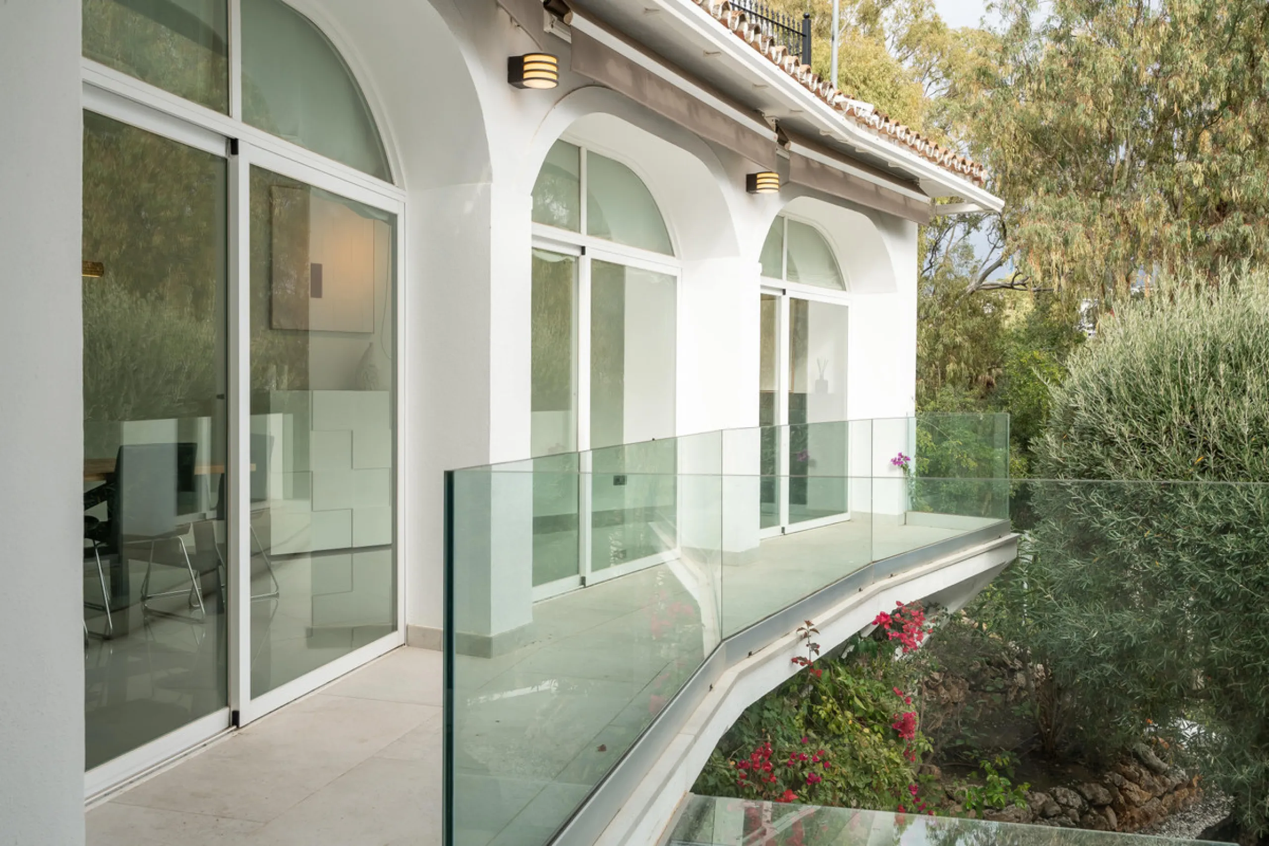 Introducing a stunning contemporary villa located in the prestigious, gated community of El Herrojo, Benahavís — one of Marbella's most desirable addresses. This elegant home combines modern luxury with serene Mediterranean living, offering privacy, secur