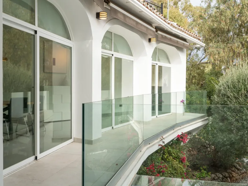 Introducing a stunning contemporary villa located in the prestigious, gated community of El Herrojo, Benahavís — one of Marbella's most desirable addresses. This elegant home combines modern luxury with serene Mediterranean living, offering privacy, secur