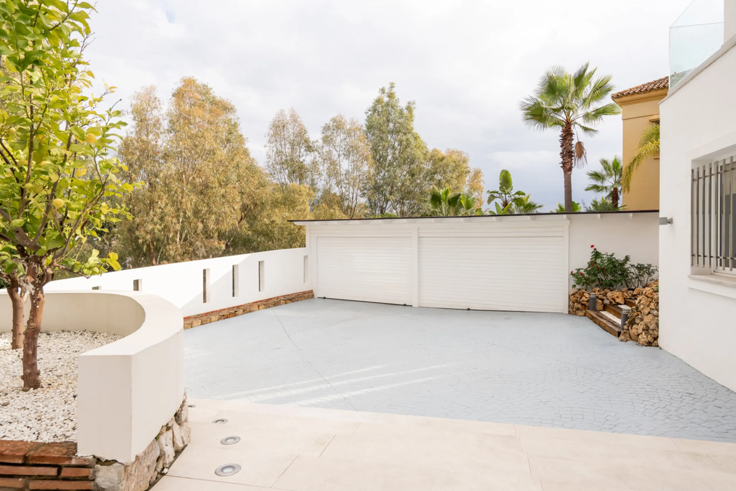 Introducing a stunning contemporary villa located in the prestigious, gated community of El Herrojo, Benahavís — one of Marbella's most desirable addresses. This elegant home combines modern luxury with serene Mediterranean living, offering privacy, secur