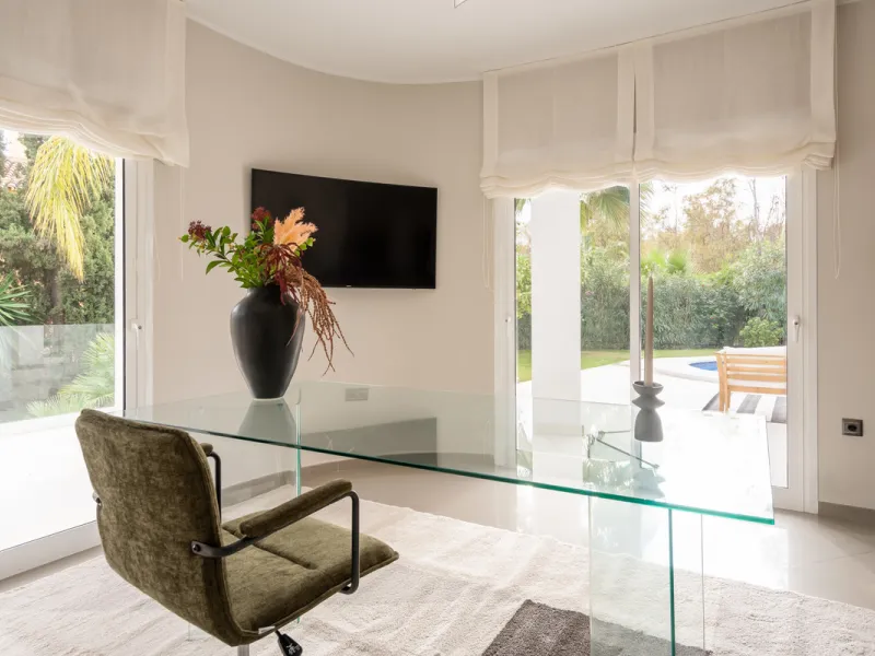 Introducing a stunning contemporary villa located in the prestigious, gated community of El Herrojo, Benahavís — one of Marbella's most desirable addresses. This elegant home combines modern luxury with serene Mediterranean living, offering privacy, secur