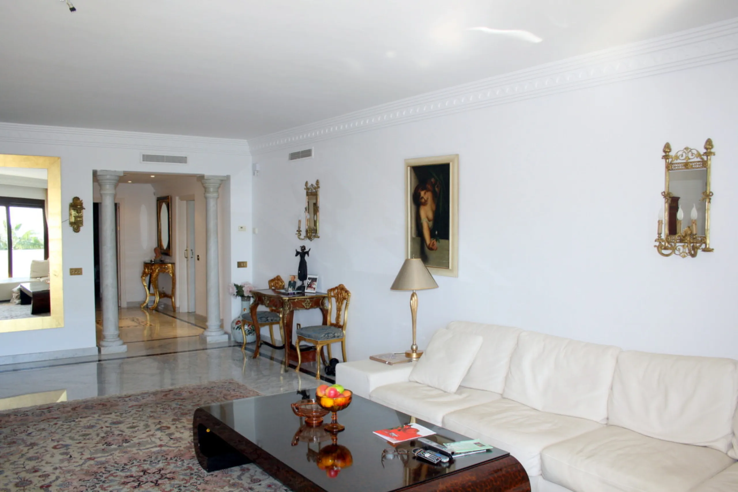 Superb south west facing first floor apartment with panoramic sea views within a five star complex in a luxurious gated urbanisation off the Golden Mile, Marbella.