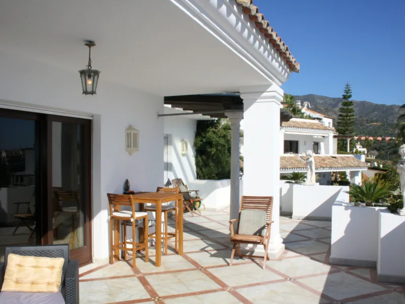 Superb south west facing first floor apartment with panoramic sea views within a five star complex in a luxurious gated urbanisation off the Golden Mile, Marbella.
