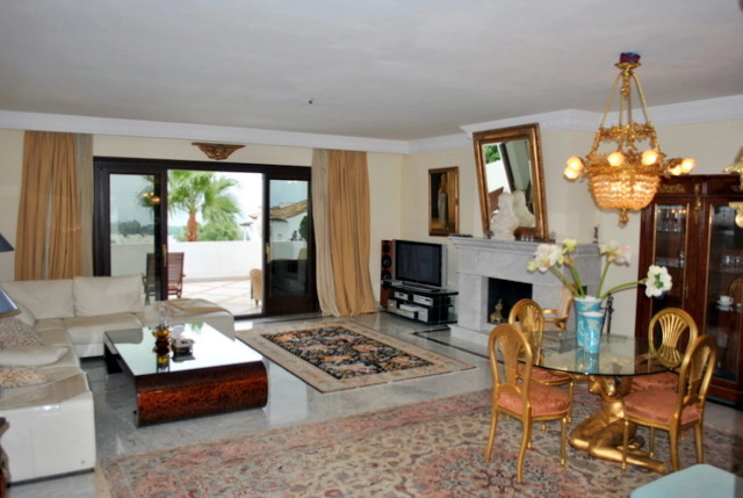 Superb south west facing first floor apartment with panoramic sea views within a five star complex in a luxurious gated urbanisation off the Golden Mile, Marbella.