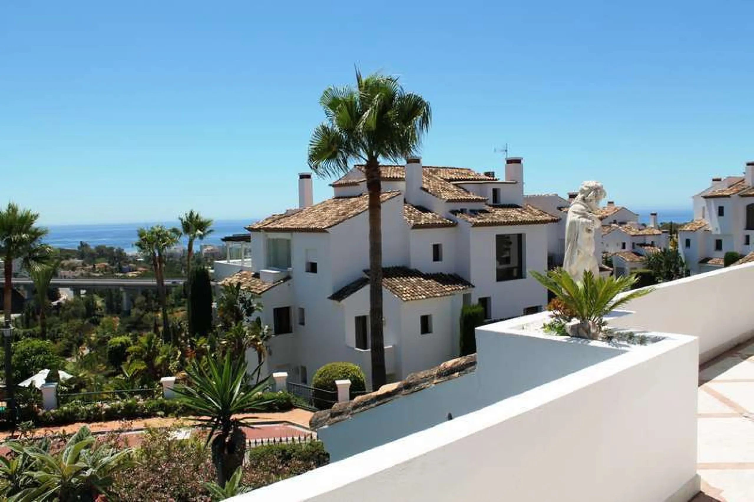 Superb south west facing first floor apartment with panoramic sea views within a five star complex in a luxurious gated urbanisation off the Golden Mile, Marbella.