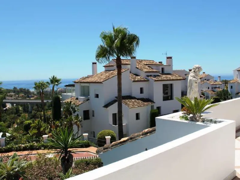 Superb south west facing first floor apartment with panoramic sea views within a five star complex in a luxurious gated urbanisation off the Golden Mile, Marbella.