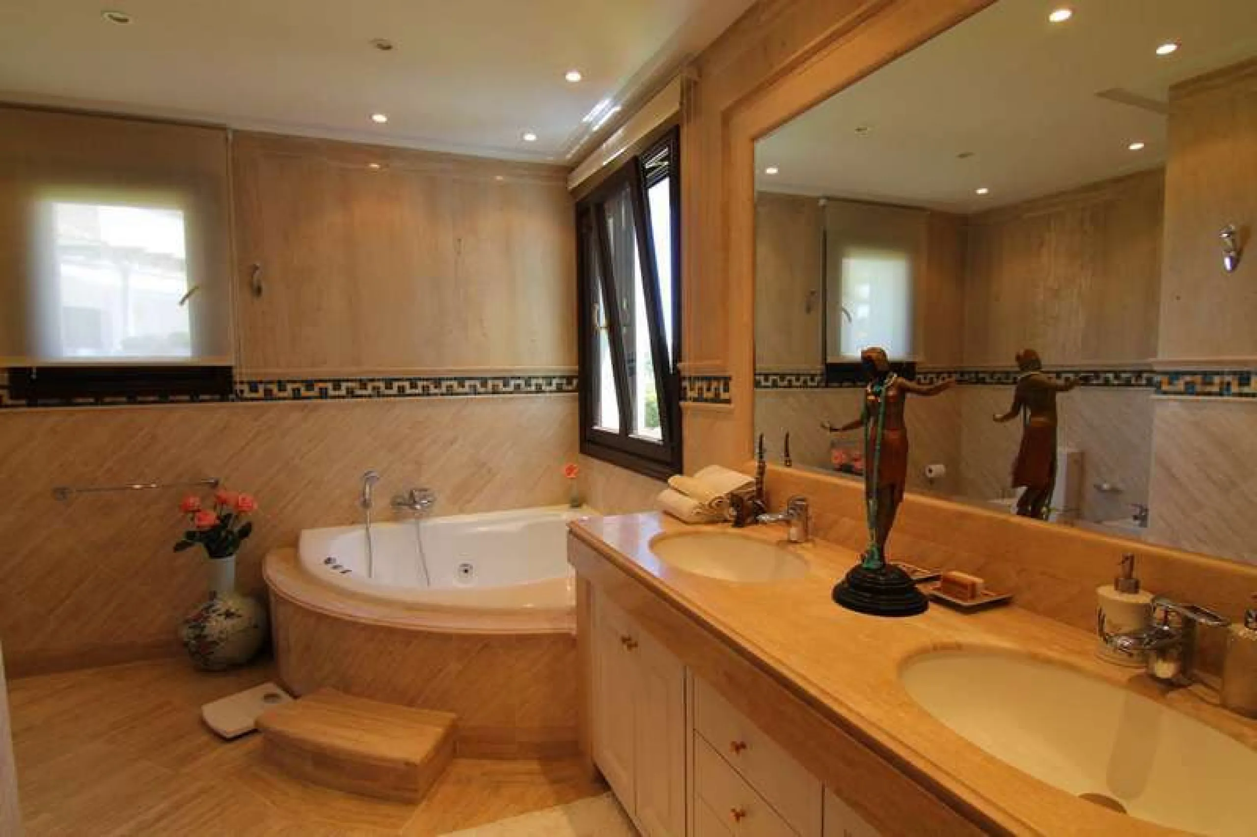 Superb south west facing first floor apartment with panoramic sea views within a five star complex in a luxurious gated urbanisation off the Golden Mile, Marbella.