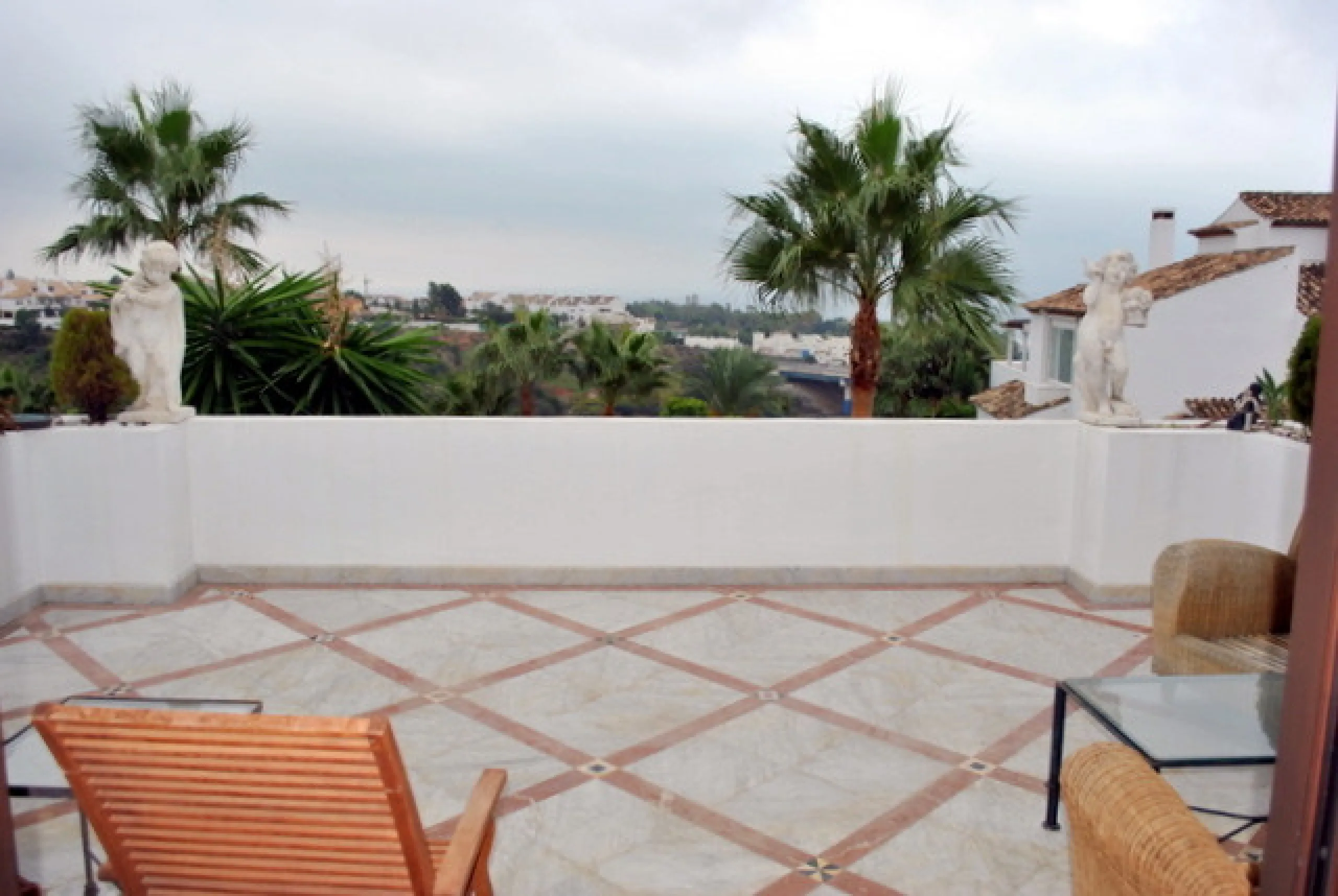 Superb south west facing first floor apartment with panoramic sea views within a five star complex in a luxurious gated urbanisation off the Golden Mile, Marbella.
