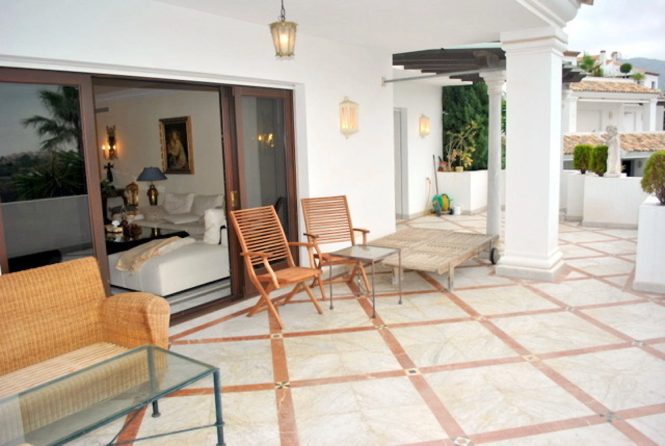 Superb south west facing first floor apartment with panoramic sea views within a five star complex in a luxurious gated urbanisation off the Golden Mile, Marbella.